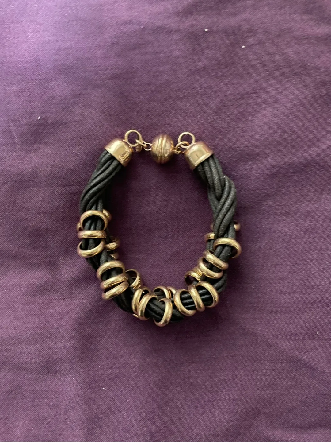 Black Bracelet with Gold Accents image indicator(2)