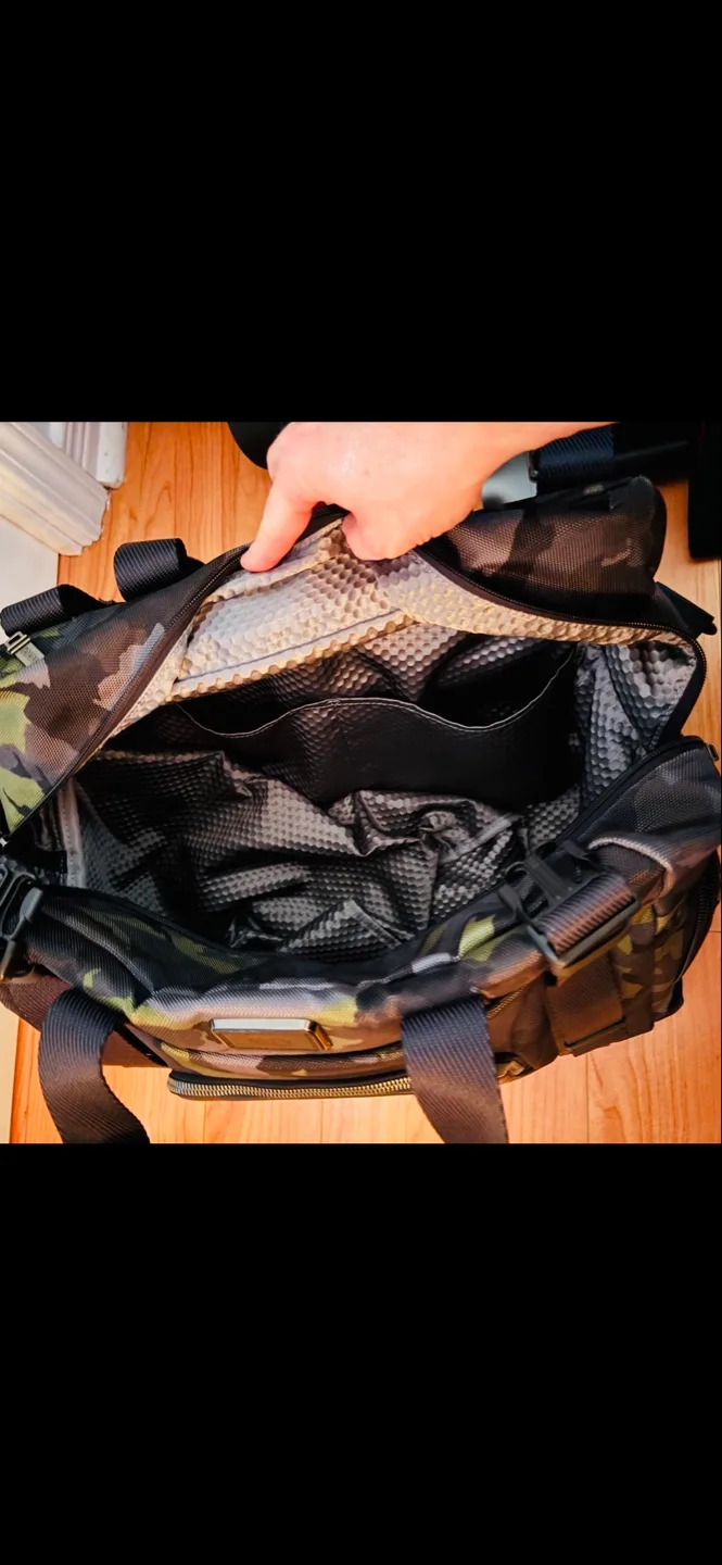 $900+ Like New, Tumi Camo Leather Duffle Bag image indicator(3)