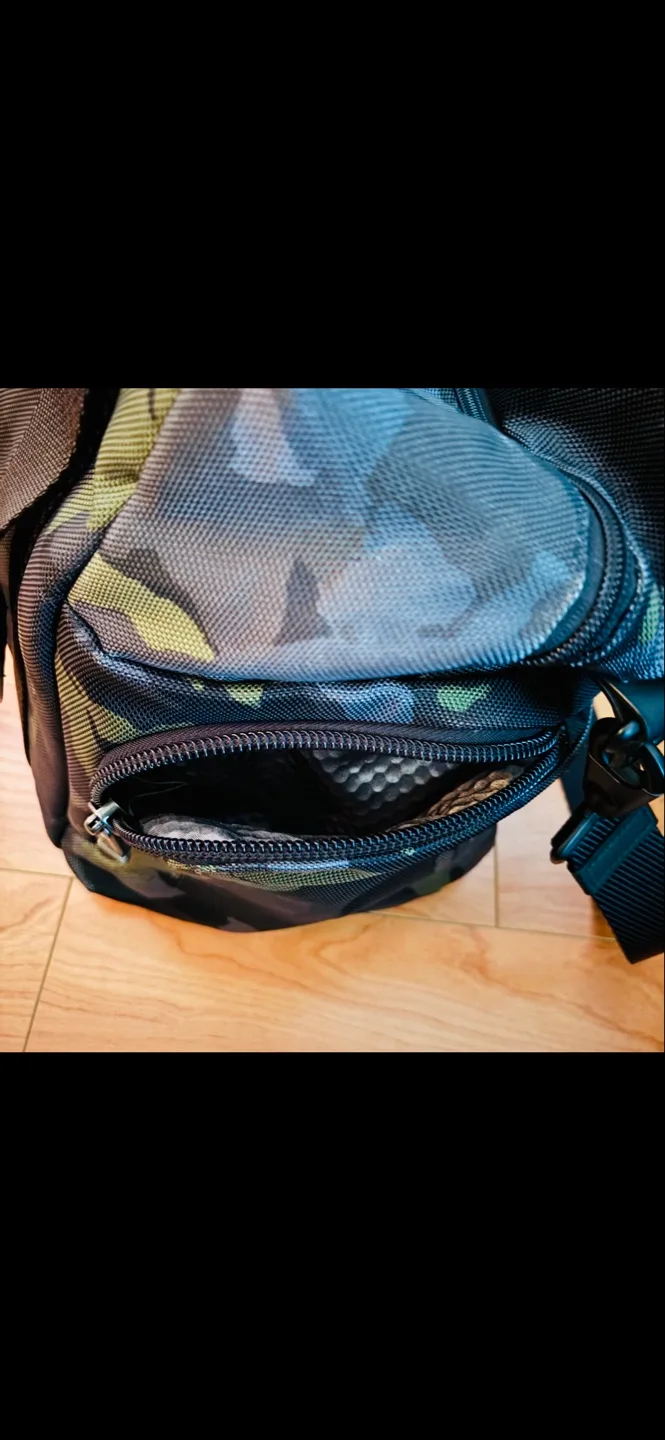 $900+ Like New, Tumi Camo Leather Duffle Bag image indicator(5)