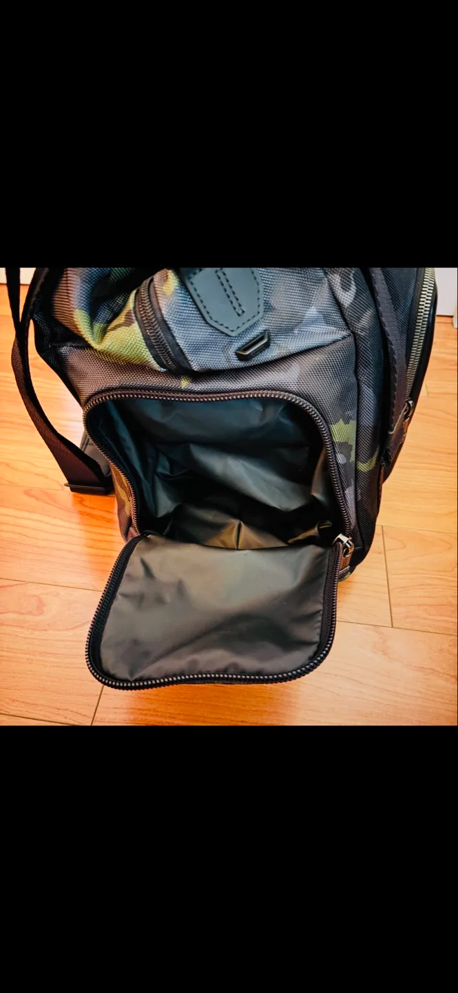 $900+ Like New, Tumi Camo Leather Duffle Bag image indicator(2)