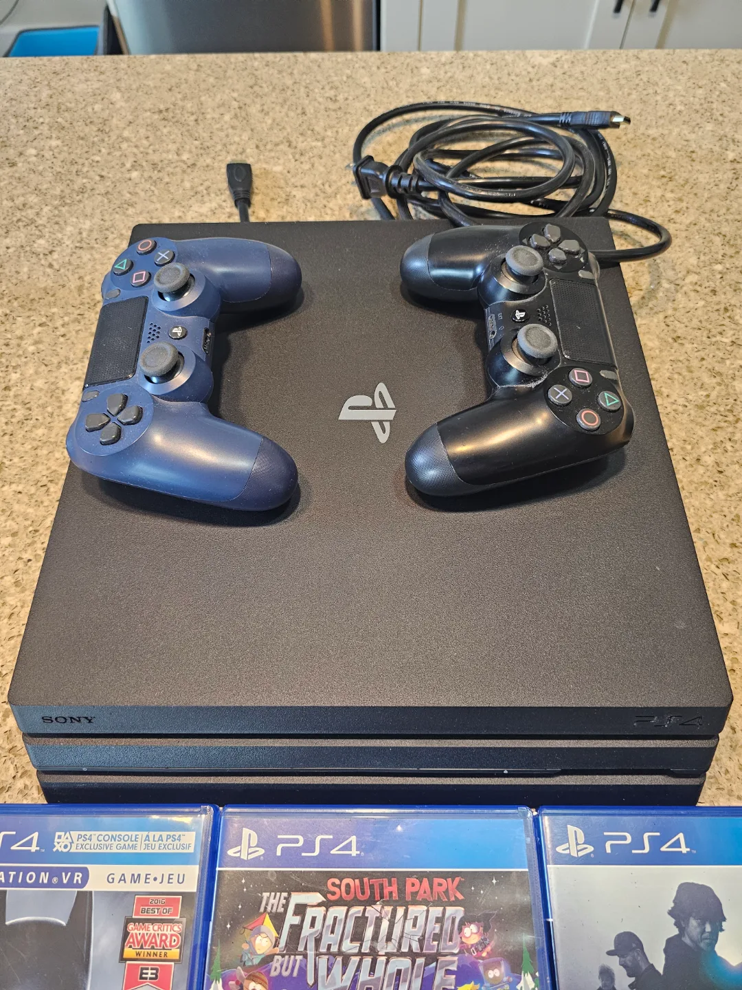 PlayStation 4 Console Bundle with Games and Controllers image indicator(2)