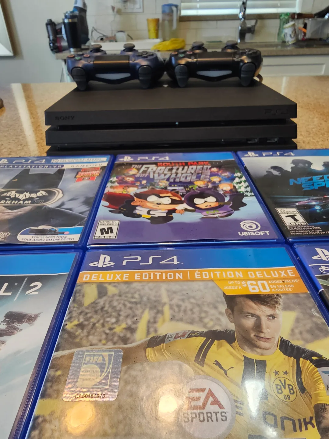 PlayStation 4 Console Bundle with Games and Controllers image indicator(3)