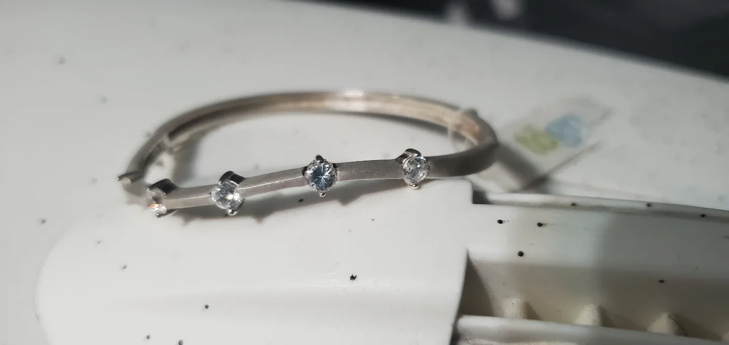 Sterling Silver Hinged Bangle Bracelet with Cubic Zirconia image indicator(2)