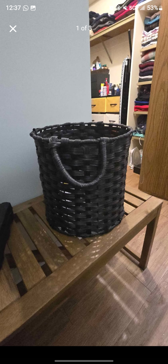 Black woven storage basket with handles