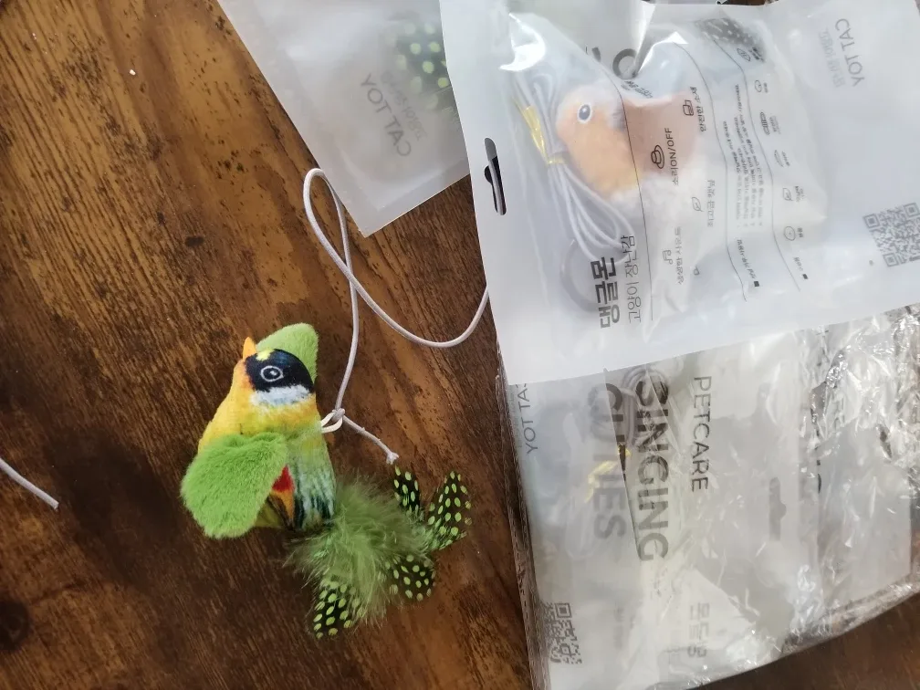 Cat toy chirping bird on string brand new image indicator(4)