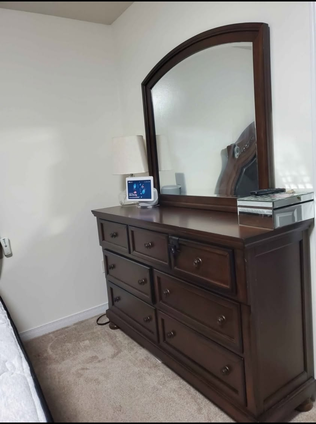 Dark brown dresser with mirror