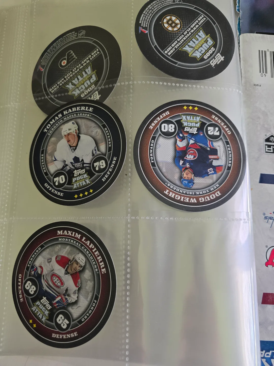 assorted sport posters, cards, pucks and games image indicator(5)