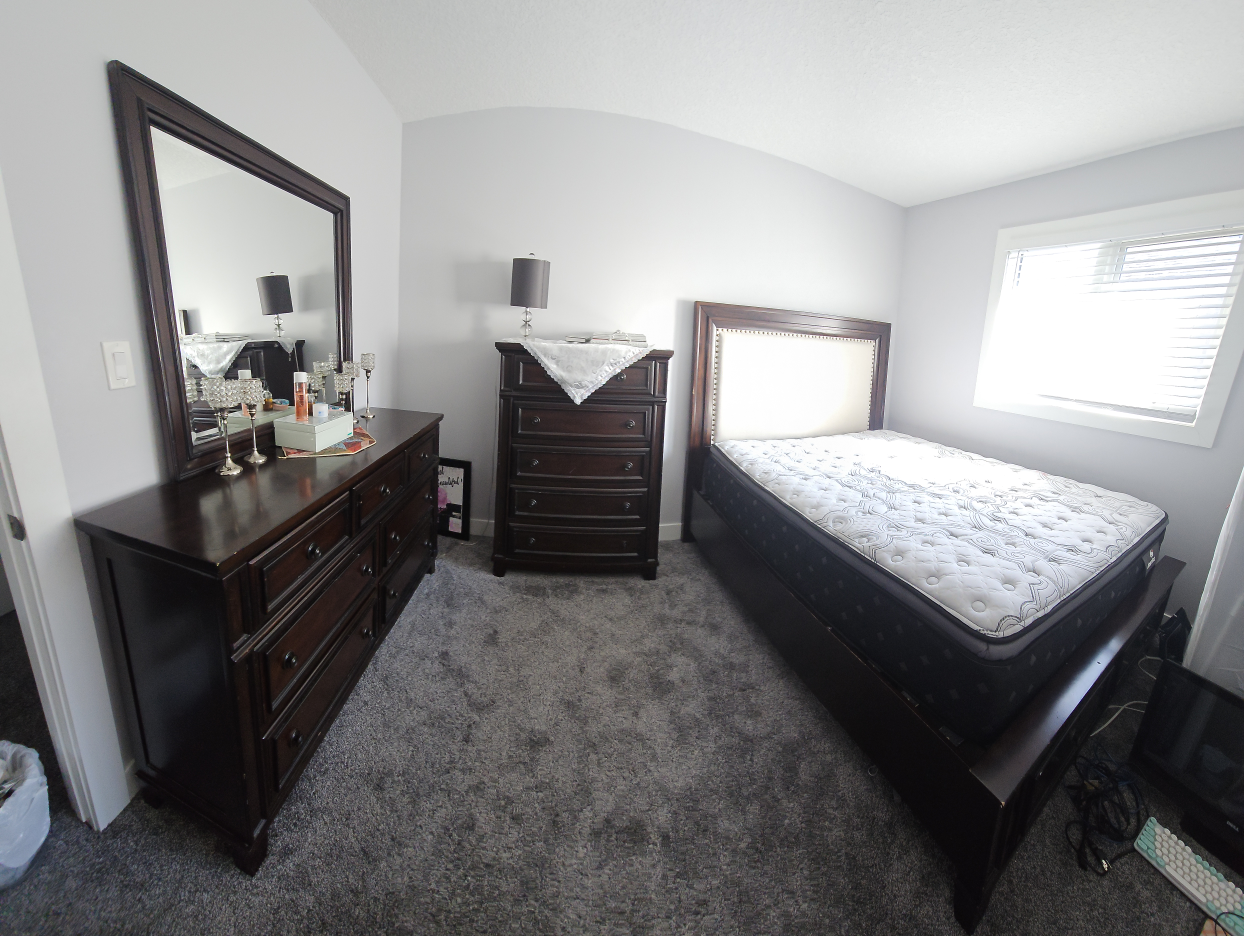 Dark brown bedroom set - dresser, mirror, and bed frame