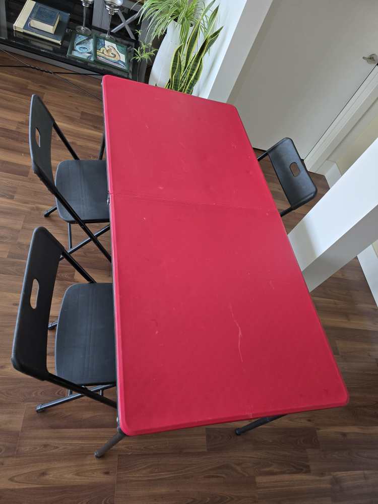 Red Folding Table and Four Black Chairs - photo 2