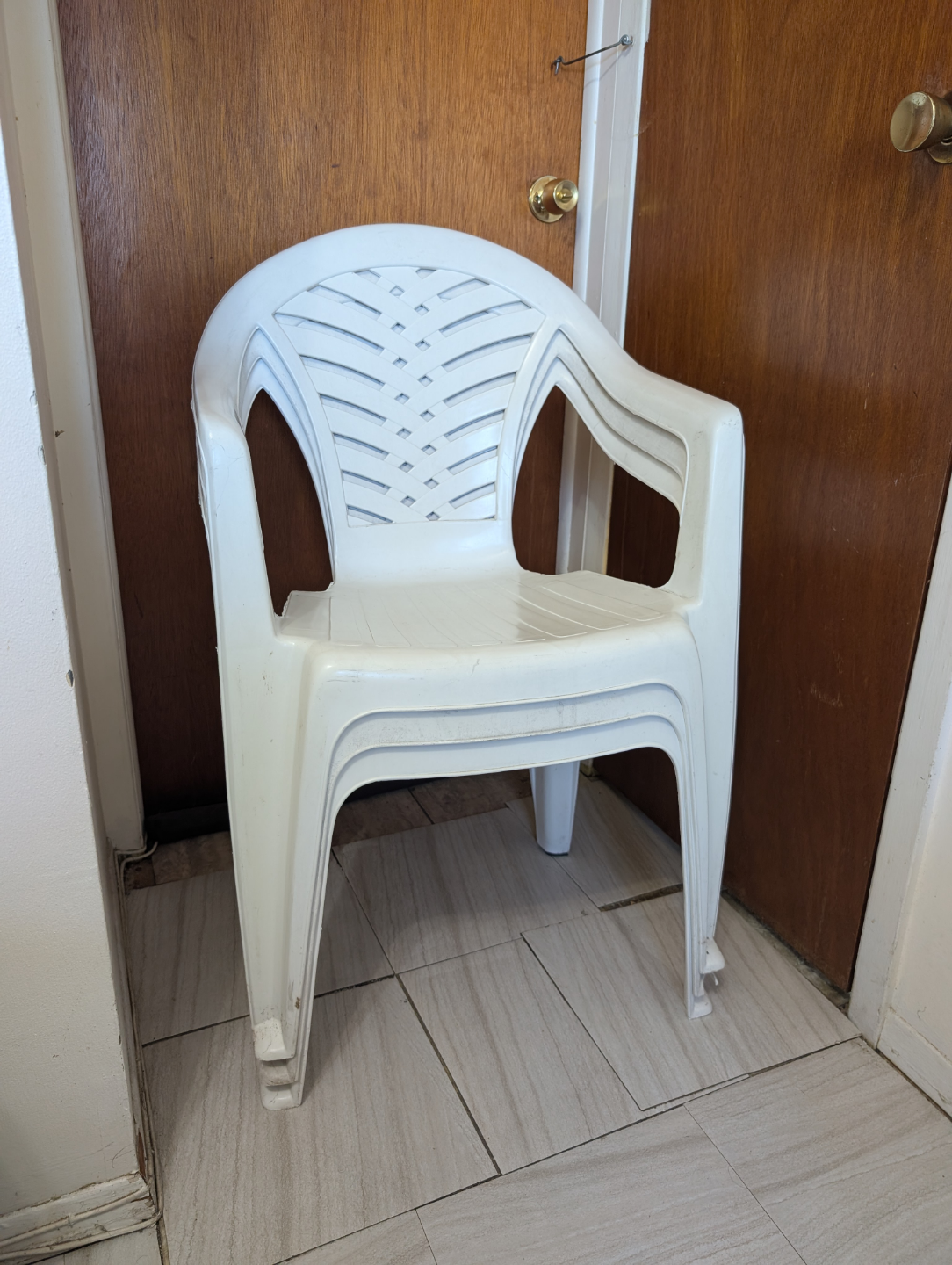 3 White Plastic lawn chairs