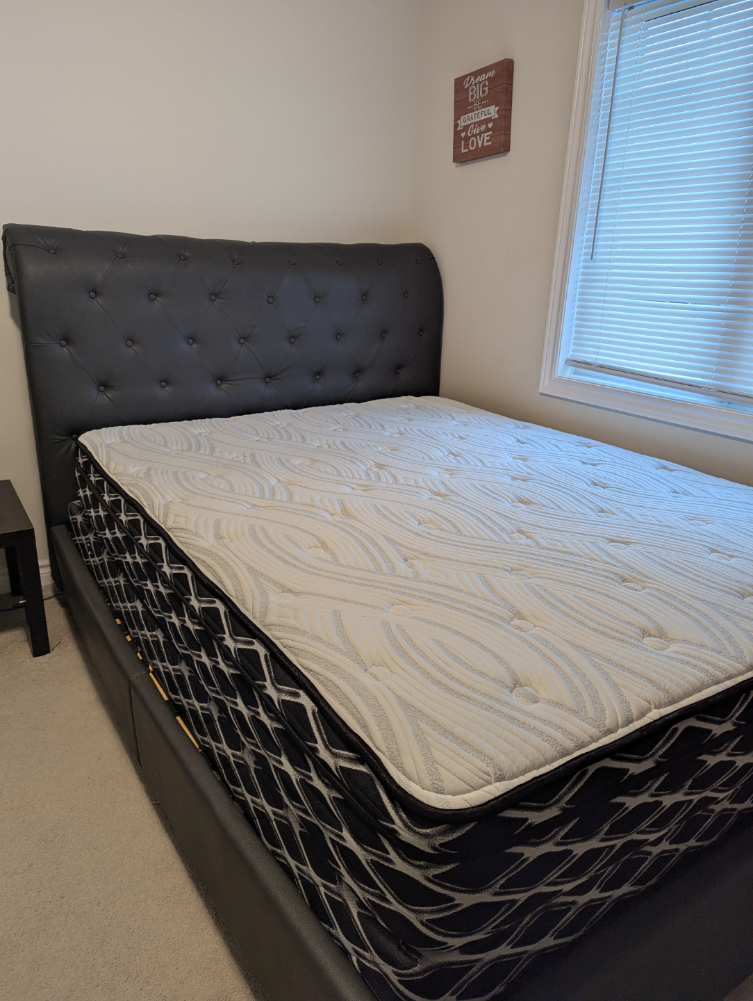 Queen-size bed frame and mattress