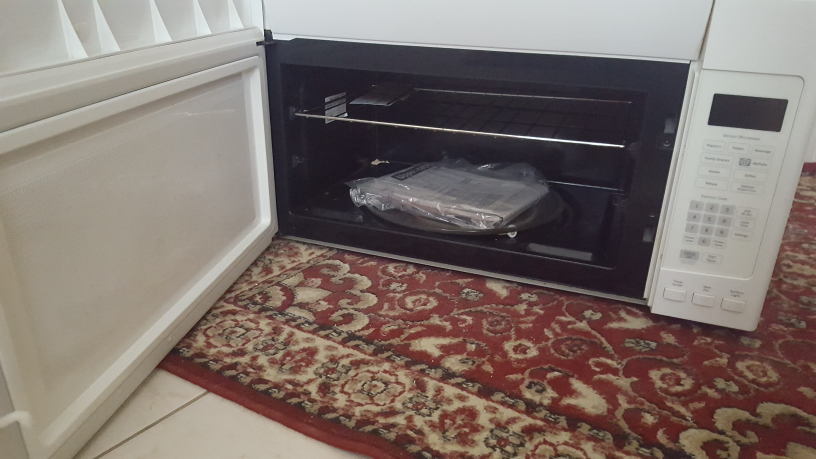 GE Over-the-Range Microwave - White - photo 5