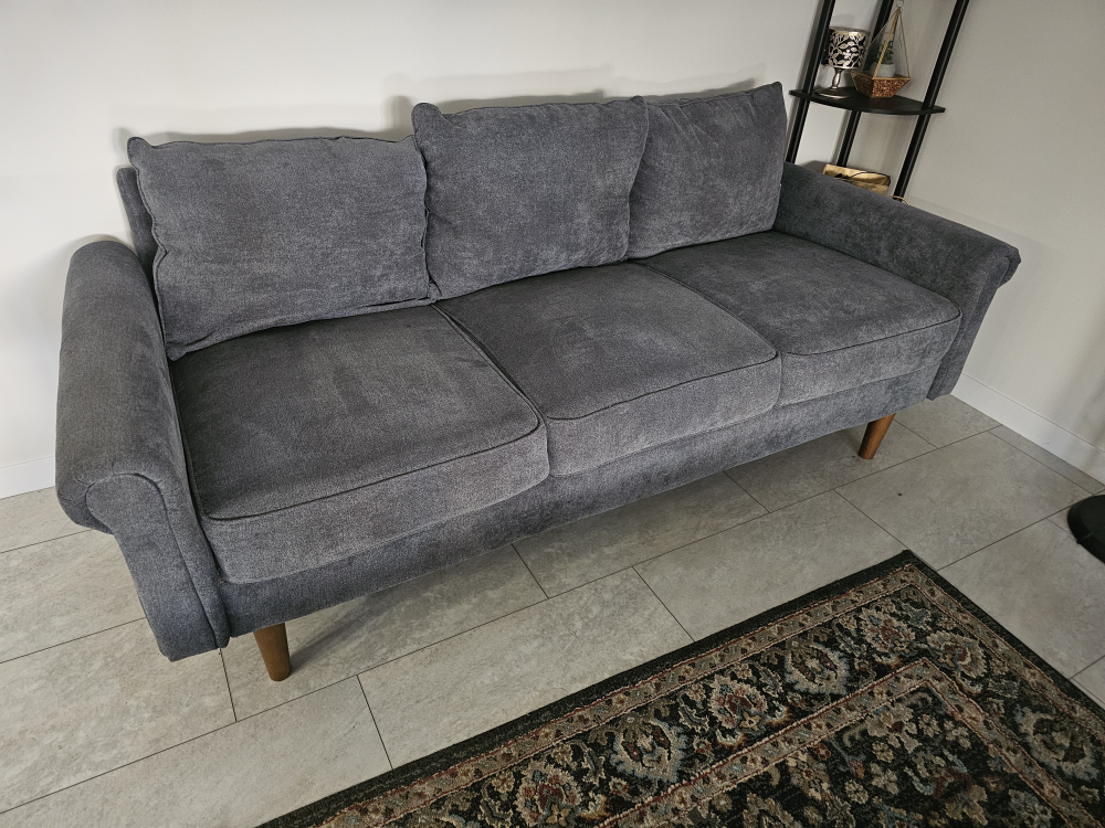 Grey fabric sofa with three cushions - photo 4