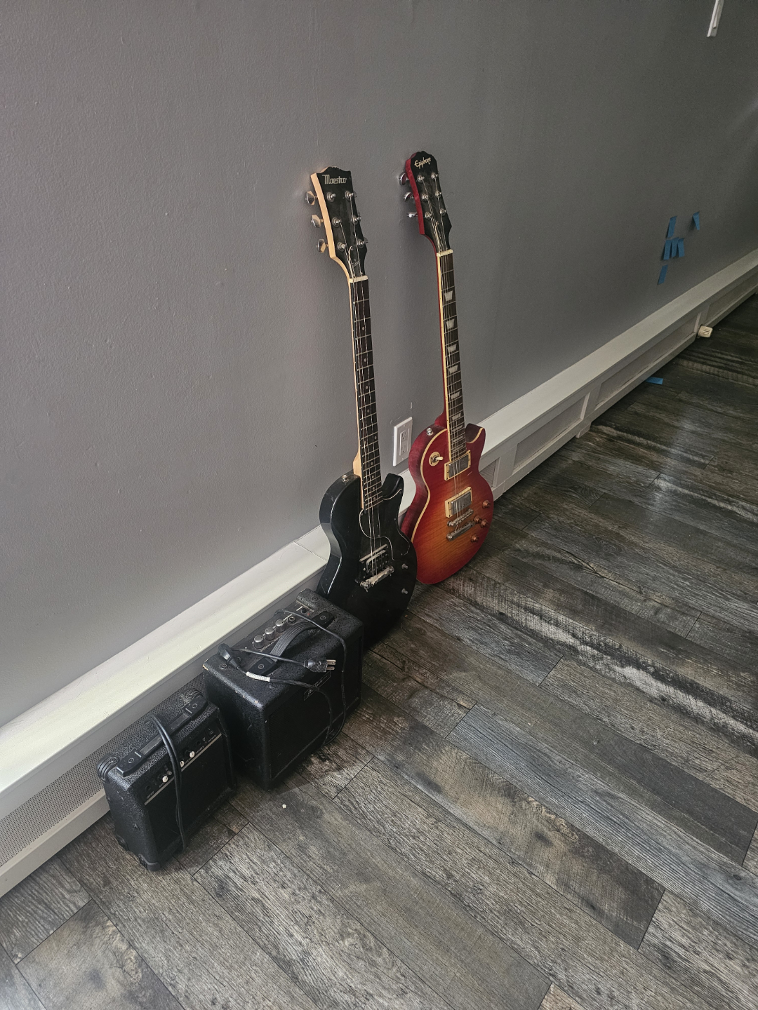 Two Electric Guitars and Two Amplifiers