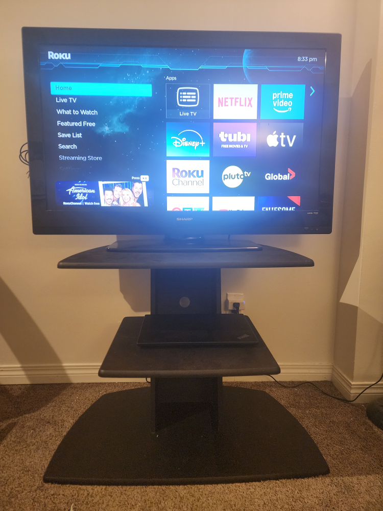 Sharp TV with Samsung Soundbar and Stand - photo 4