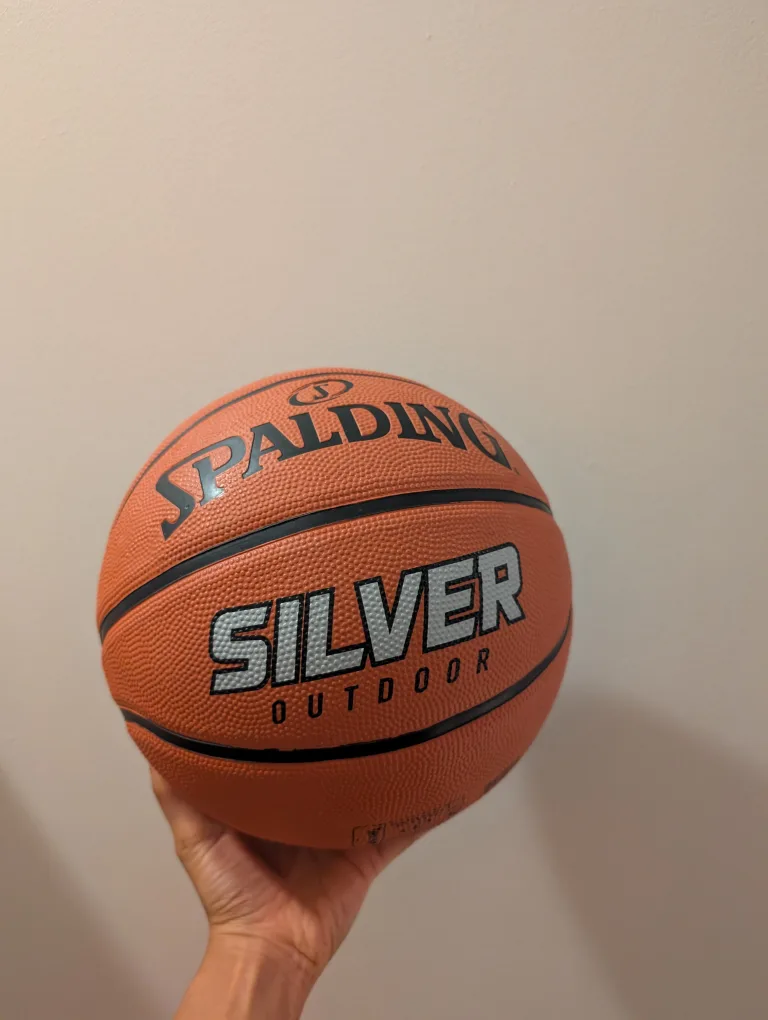 💚 Spalding Silver Outdoor Basketball - Size 7 thumbnail