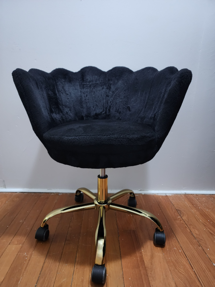 Velvet black chair .