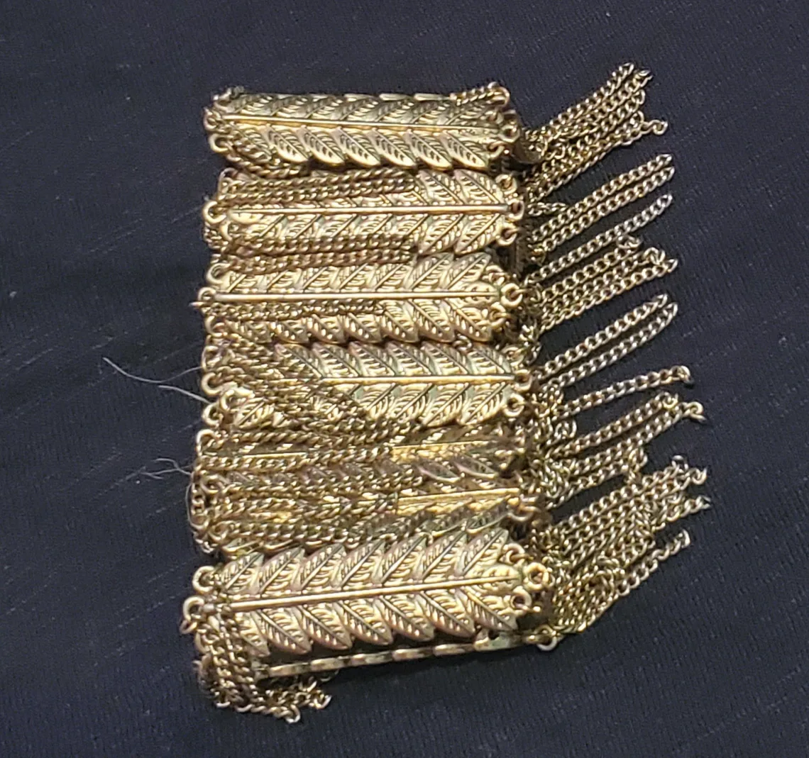 Gold Statement Bracelet with Leaf and Chain Detail image indicator(3)