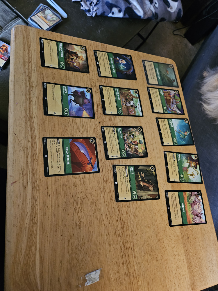 set of 12 Lorcana trading cards