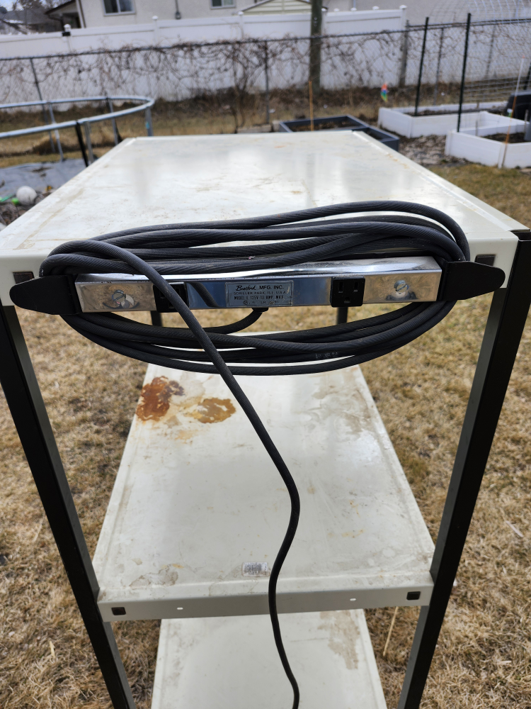 Three-shelf metal rolling cart with power strip - photo 2