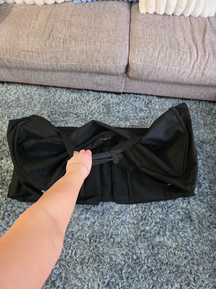 Large Black Rolling Duffel Bag image indicator(4)