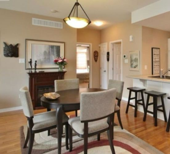 Round Dark Brown Dining Table with Four Chairs