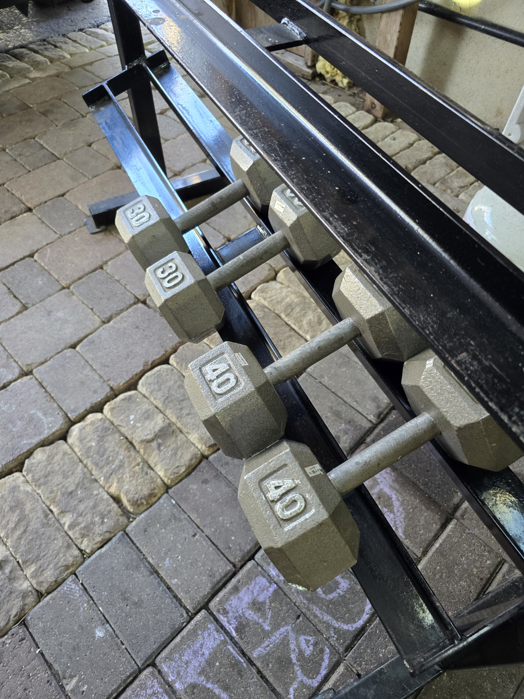 Set of dumbbells with rack
