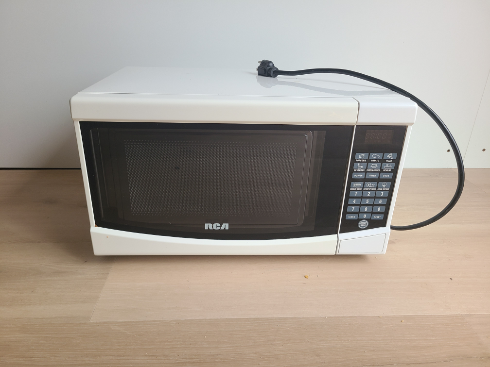 RCA 0.7 Cu. Ft. Small White Microwave