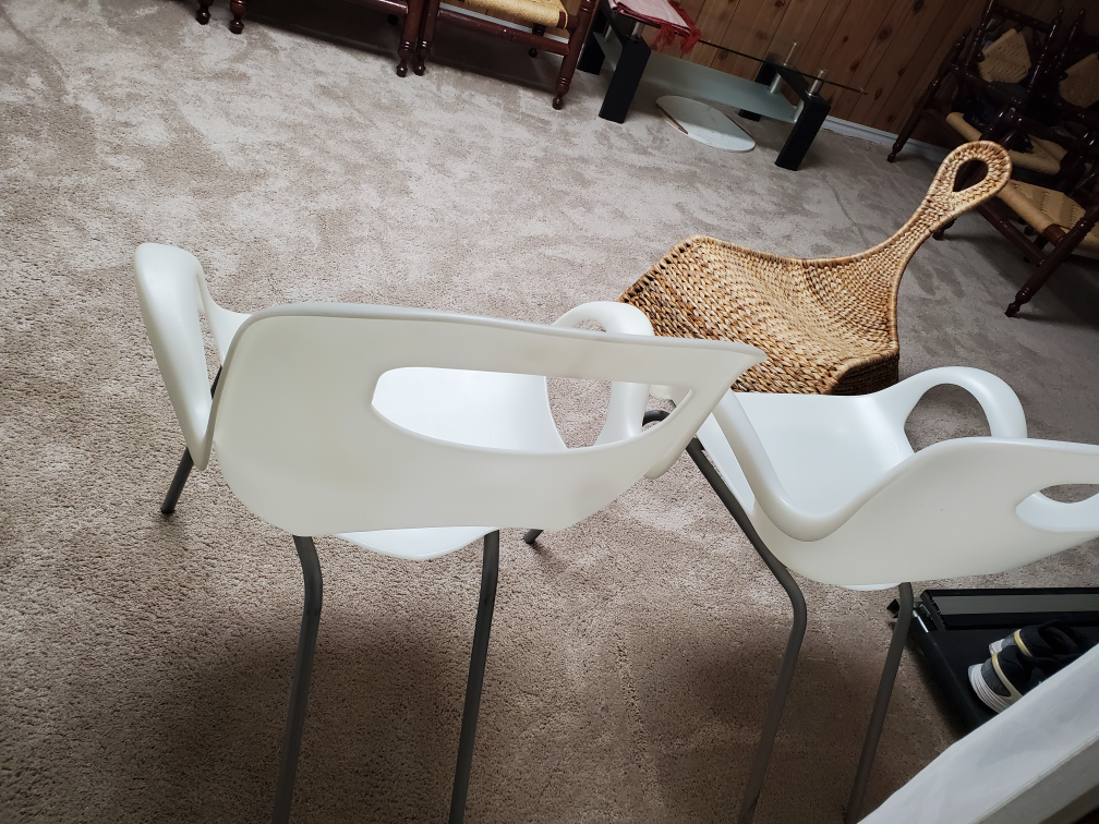 Pair of White Plastic Armchairs