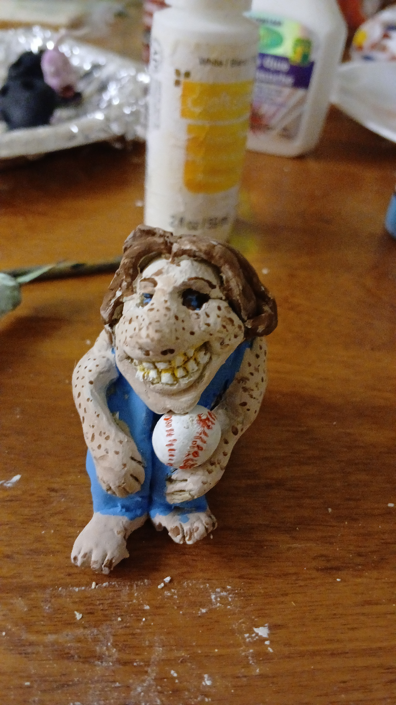 Hand-painted clay figurine of a baseball player - photo 2
