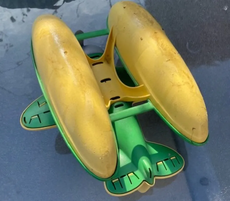 Green and Yellow Vintage Toy Airplane image indicator(2)