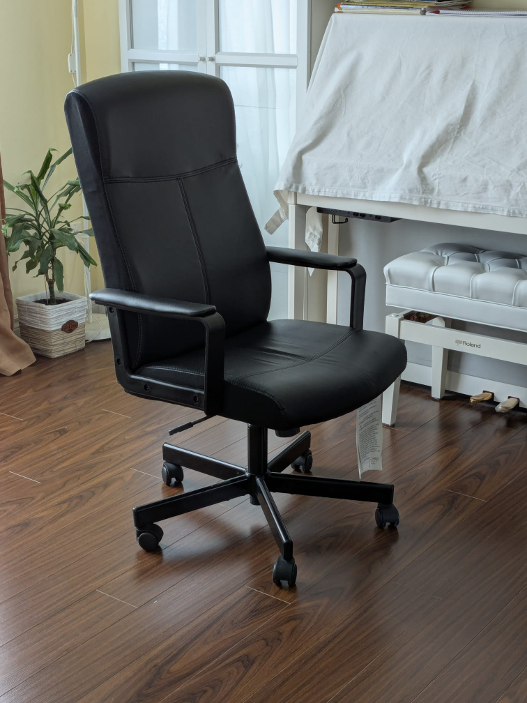 IKEA Black Faux Leather Office Chair with Wheels - photo 2