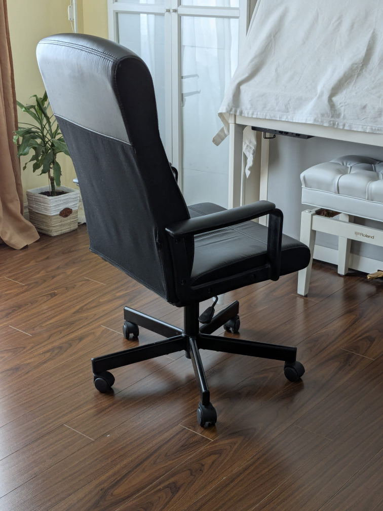 IKEA Black Faux Leather Office Chair with Wheels - photo 3