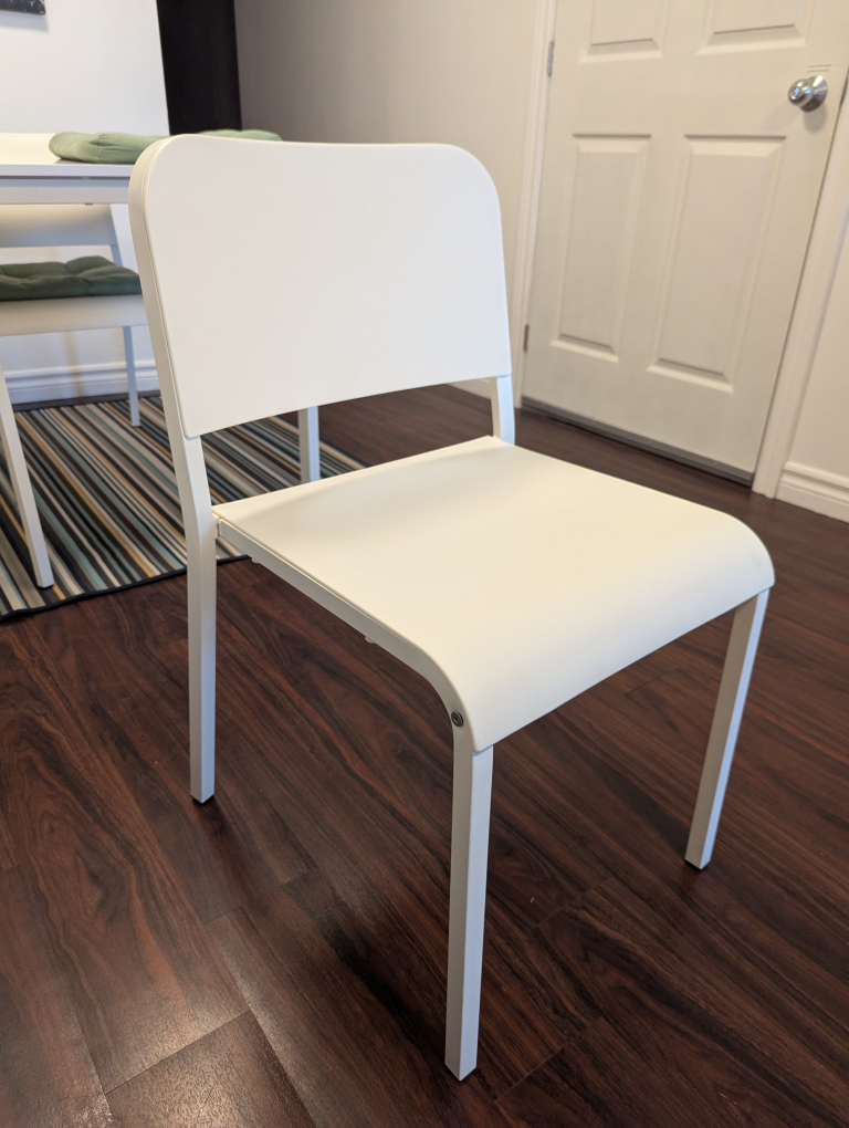 four ikea melltorp chairs