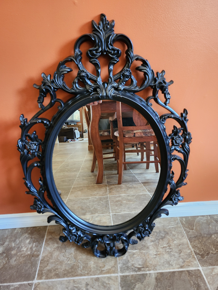 Ornate Black Oval Mirror