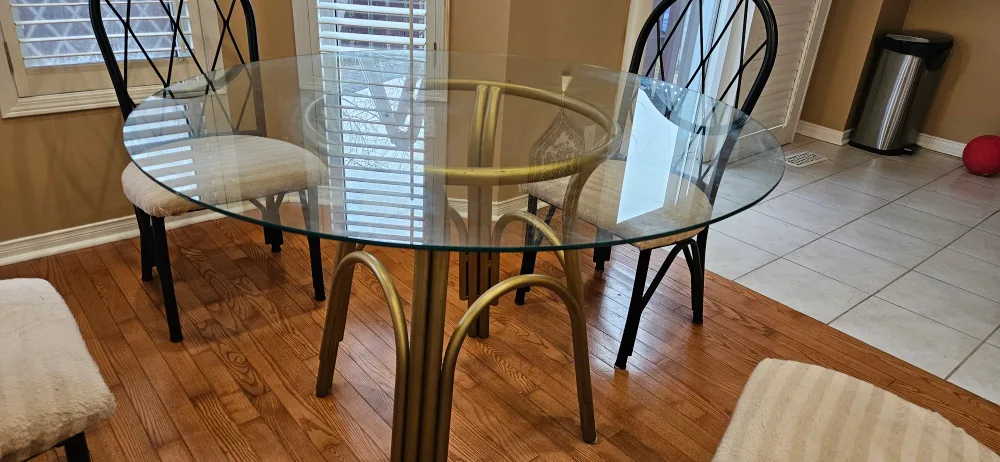 Glass-top dining table and four chairs image indicator(4)