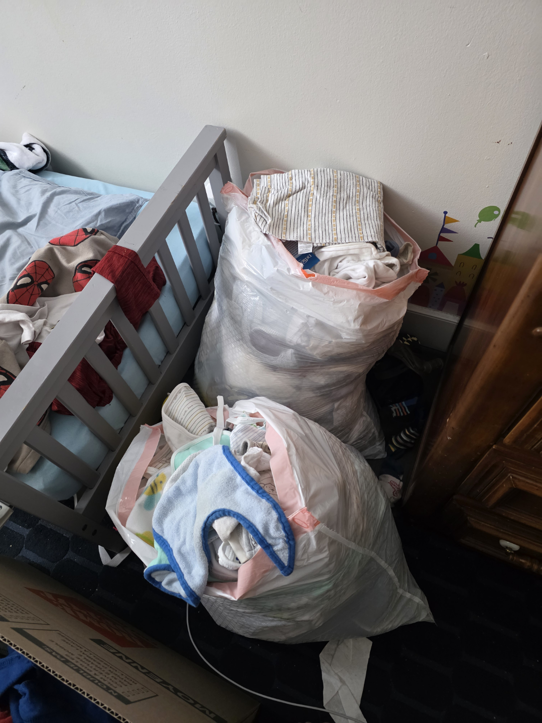2 bags of newborn clothes