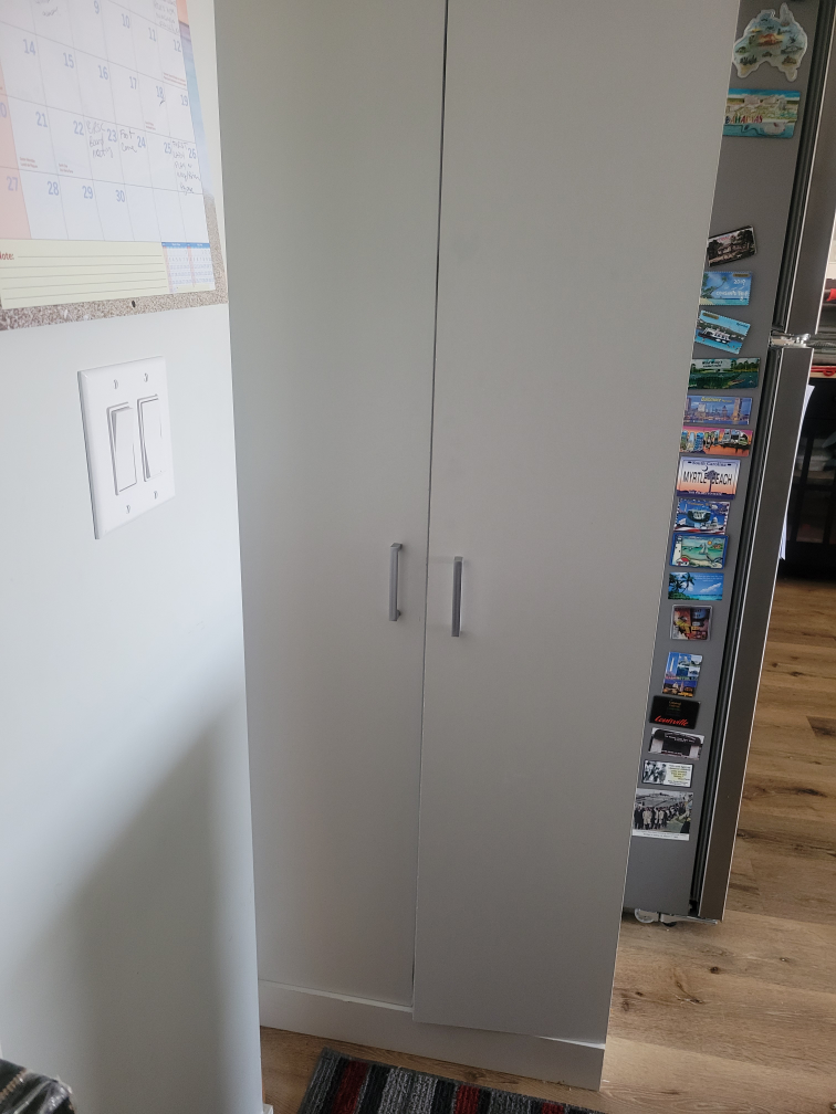 white 2 door storage cabinet
