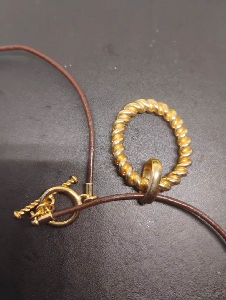 Ann Klein Gold Circle Pendant Necklace on Leather Cord image indicator(2)