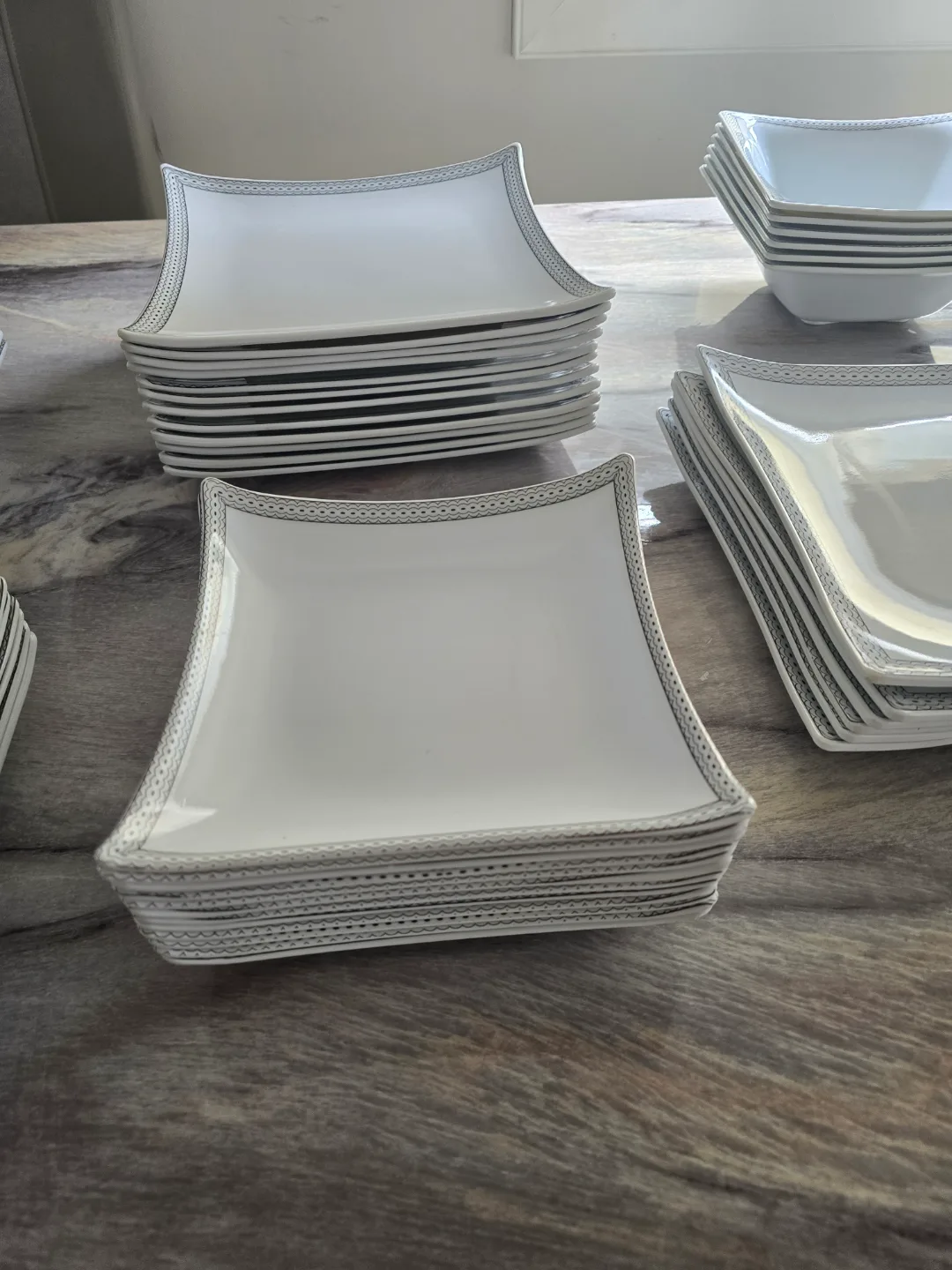 Elegant White Dinnerware Set with Silver Accents image indicator(3)