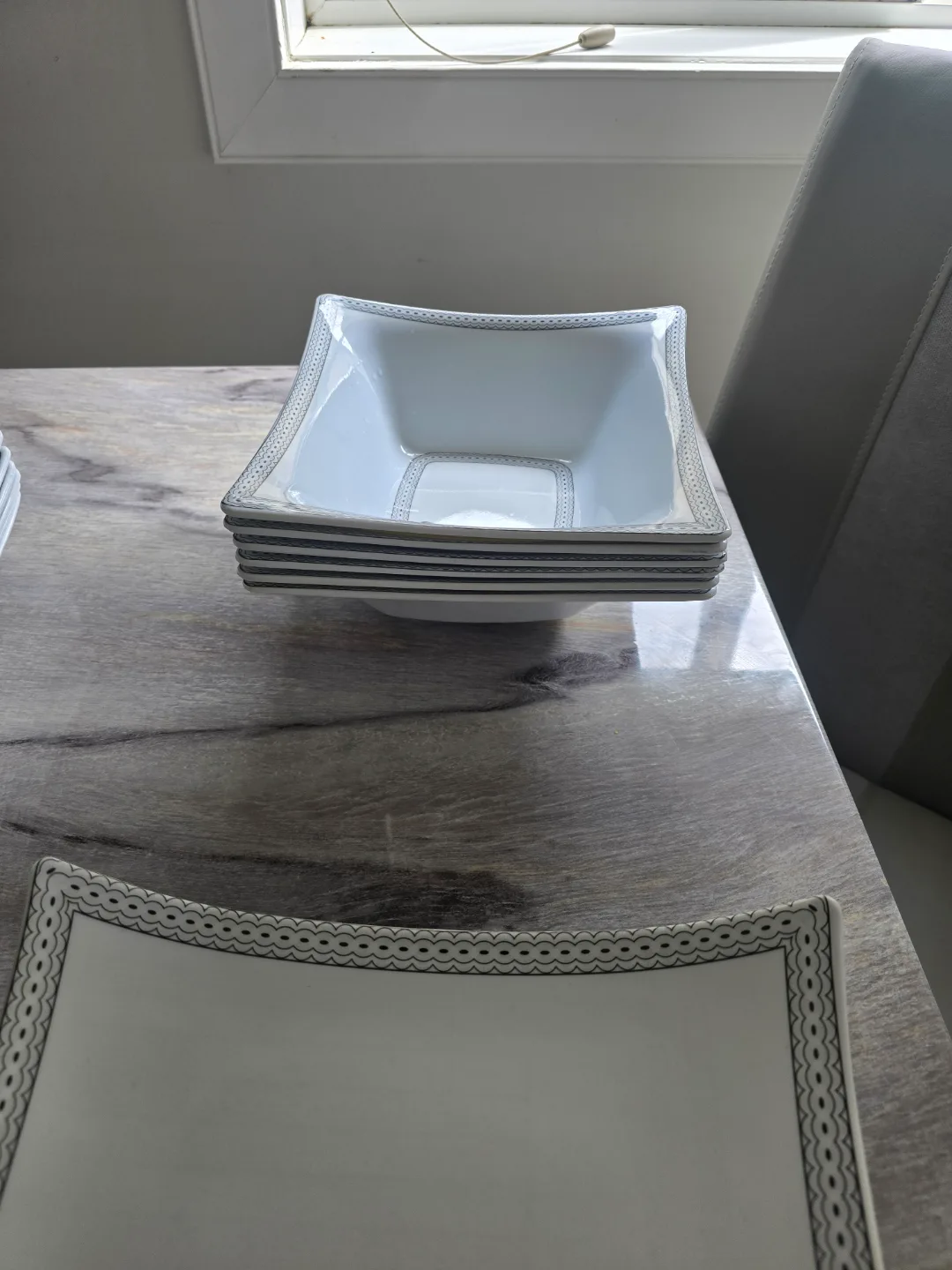 Elegant White Dinnerware Set with Silver Accents image indicator(5)