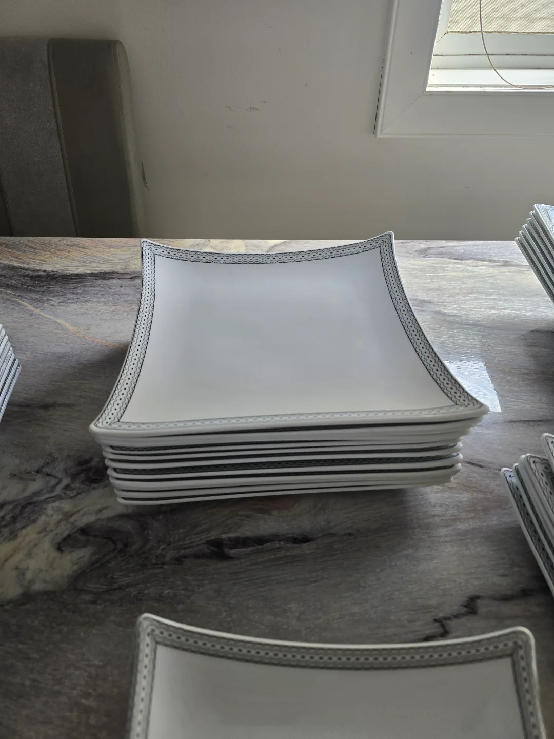 Elegant White Dinnerware Set with Silver Accents image indicator(6)