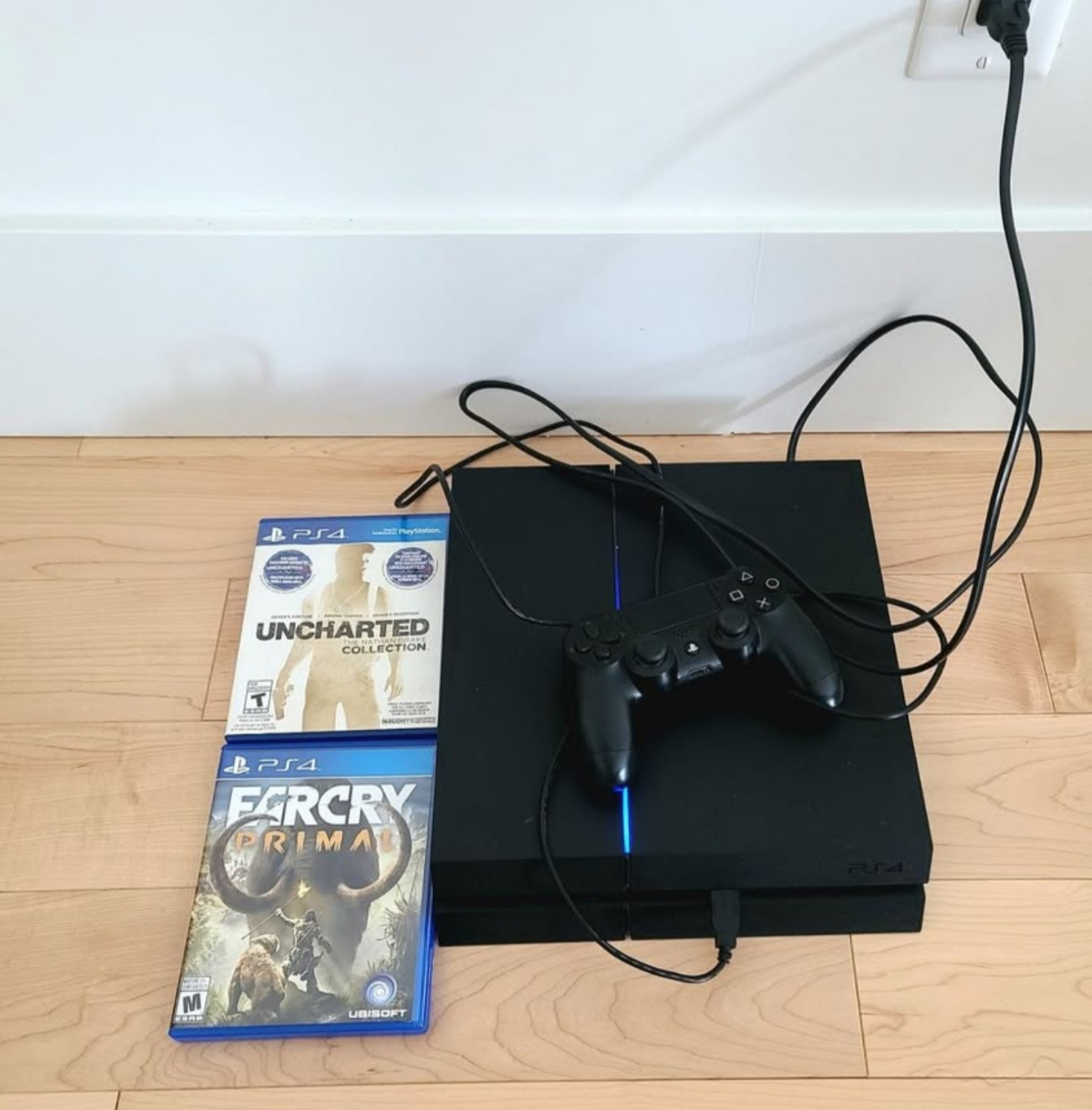 PS4 Console with 2 Games - Uncharted Collection & Far Cry Primal
