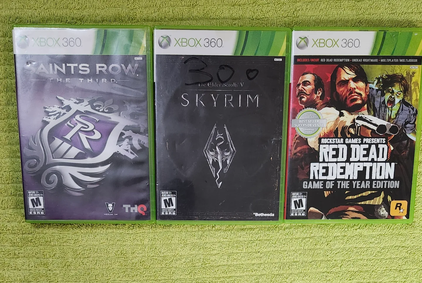 X box 360 e with all wires and wireless controller and 22 games image indicator(10)