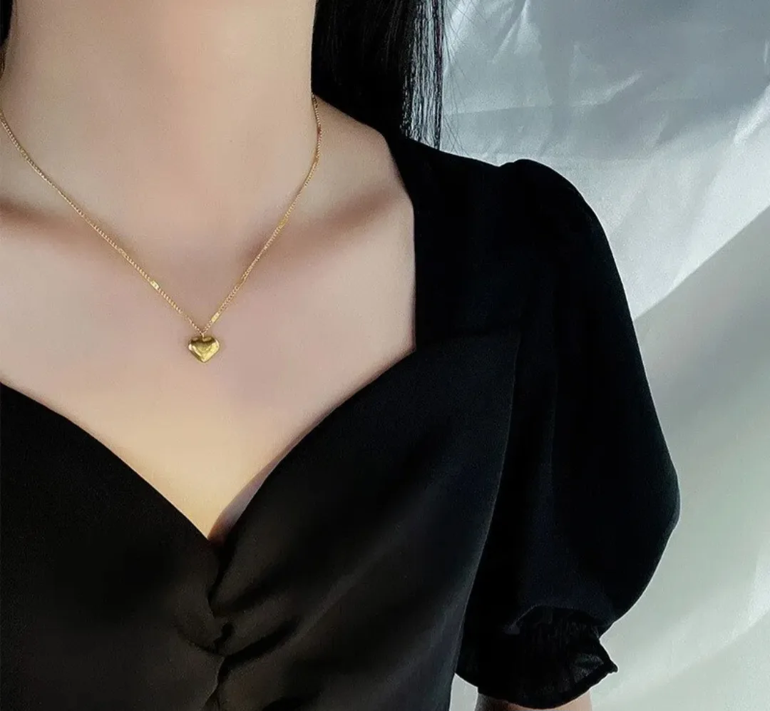 Gold Heart Necklace with 'Love' Inscription image indicator(5)