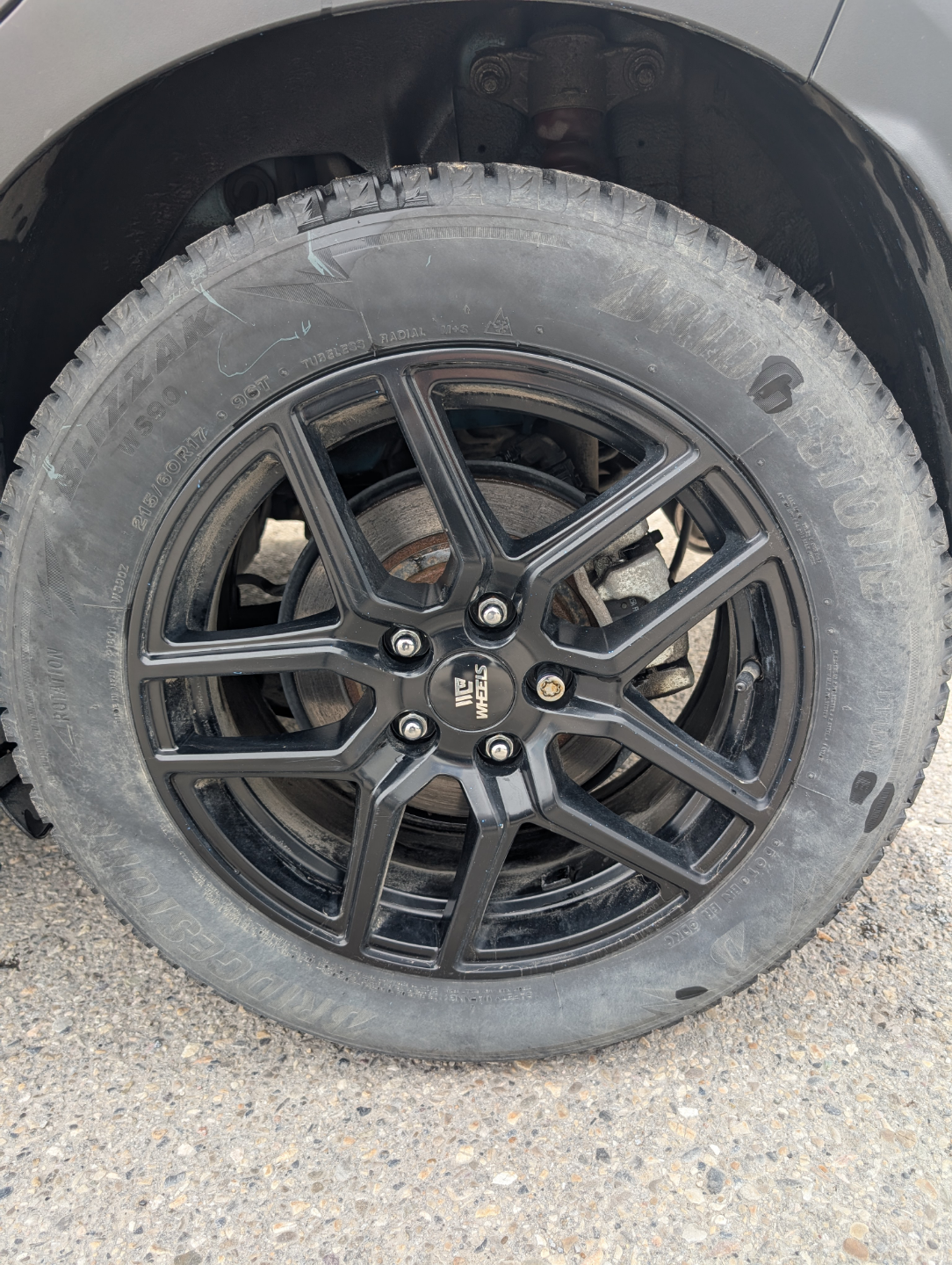 Used 17" Black Alloy Wheel with Bridgestone Blizzak Tire