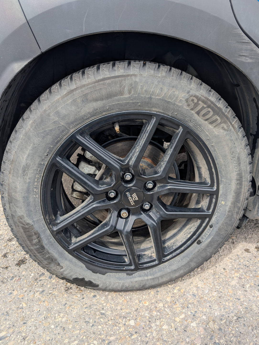 Used 17" Black Alloy Wheel with Bridgestone Blizzak Tire - photo 3