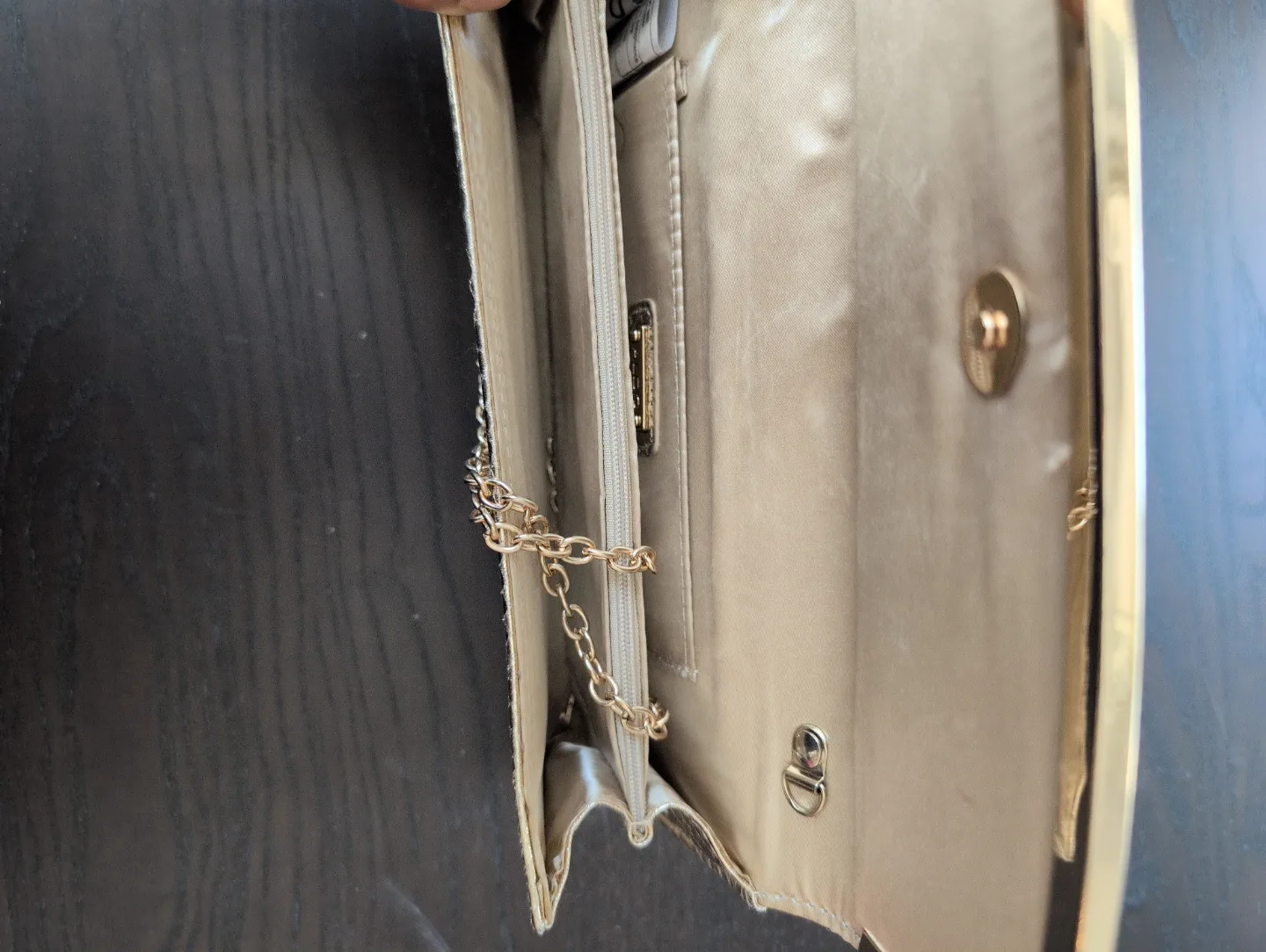 Gold Snakeskin-Patterned ALDO Clutch image indicator(3)