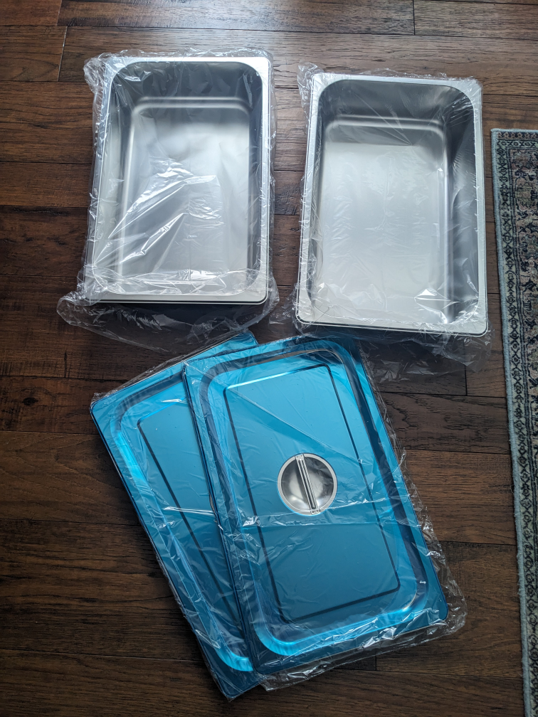 full size steam pans brand new with lids
