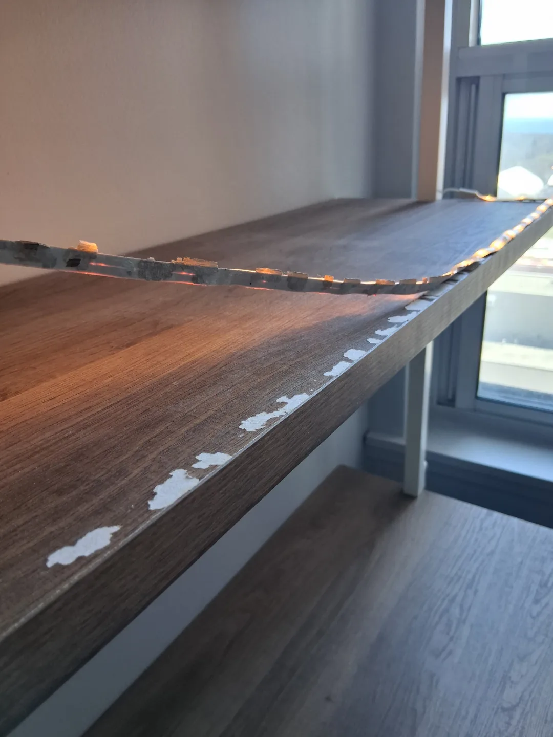 Wall-mounted desk with shelving unit image indicator(10)